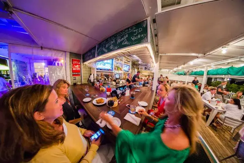 Stroll, Boat, Paddle or Bike to These Popular Outdoor Bars